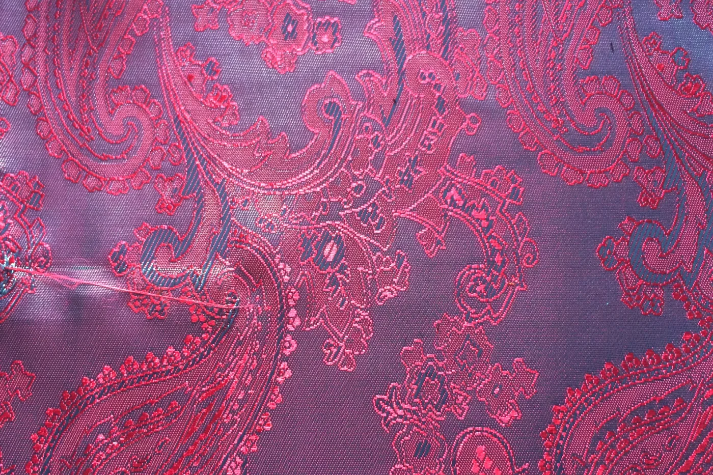 Linings 27063-52 RED ON GREY PAISLEY fabric swatch