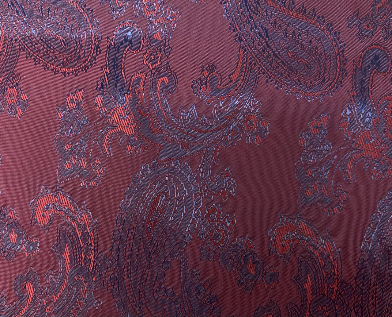 Linings 27064-52 RED ON PURPLE PAISLEY fabric swatch