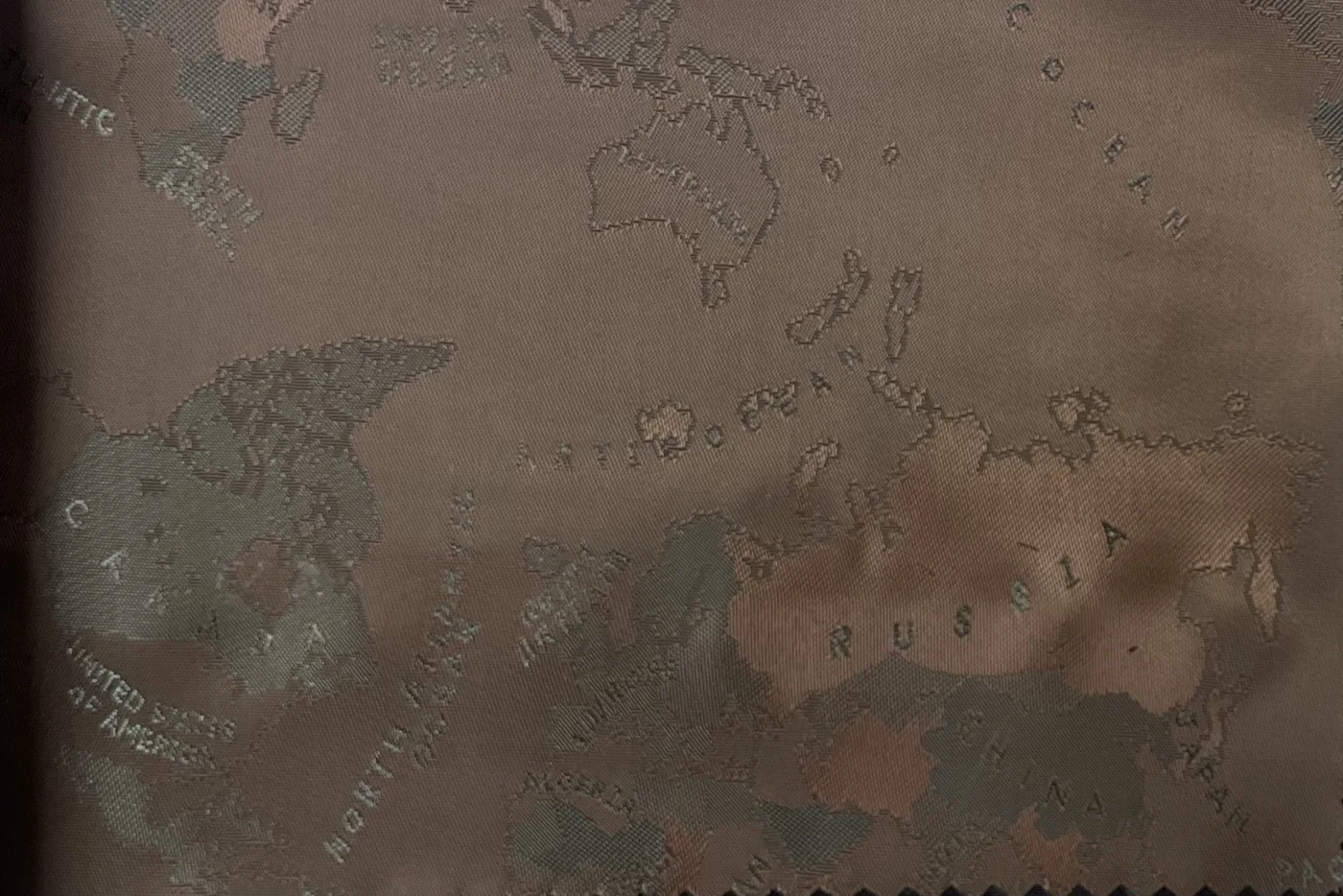 Linings 29100-52 MED BROWN WORLD MAP fabric swatch