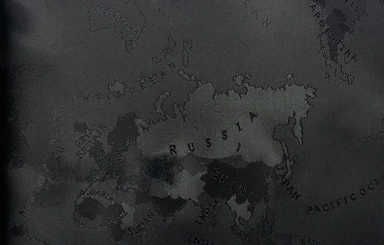 Linings 29101-52 BLACK WORLD MAP fabric swatch